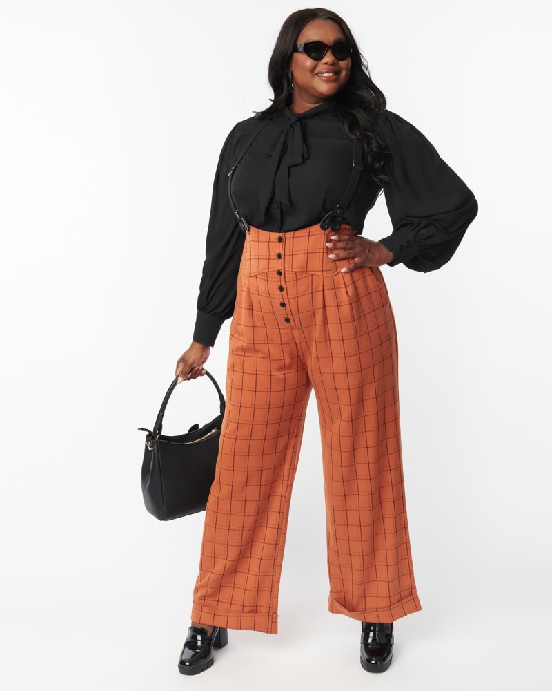Front of a model wearing a size 5X Unique Vintage Orange Windowpane Thelma Suspender Pants in Orange, Plaid, Gingham by Unique Vintage. | dia_product_style_image_id:287506